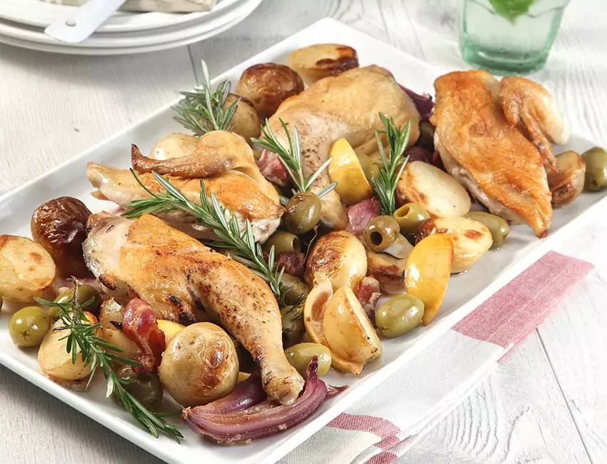 Tray-Baked Chicken with Potatoes, Rosemary, Lemon, & Olives